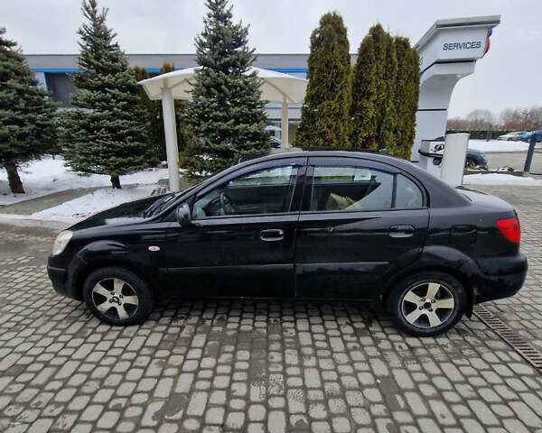 Чорний Кіа Ріо, об'ємом двигуна 1.49 л та пробігом 234 тис. км за 3400 $, фото 5 на Automoto.ua