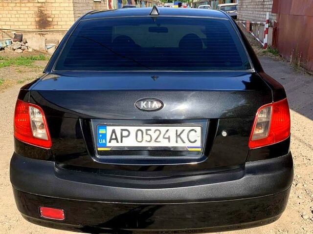 Чорний Кіа Ріо, об'ємом двигуна 1.5 л та пробігом 236 тис. км за 4500 $, фото 2 на Automoto.ua