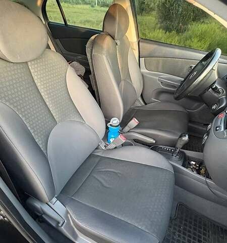 Черный Киа Рио, объемом двигателя 1.4 л и пробегом 168 тыс. км за 5600 $, фото 7 на Automoto.ua