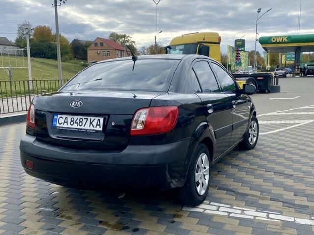 Черный Киа Рио, объемом двигателя 1.4 л и пробегом 152 тыс. км за 4600 $, фото 3 на Automoto.ua