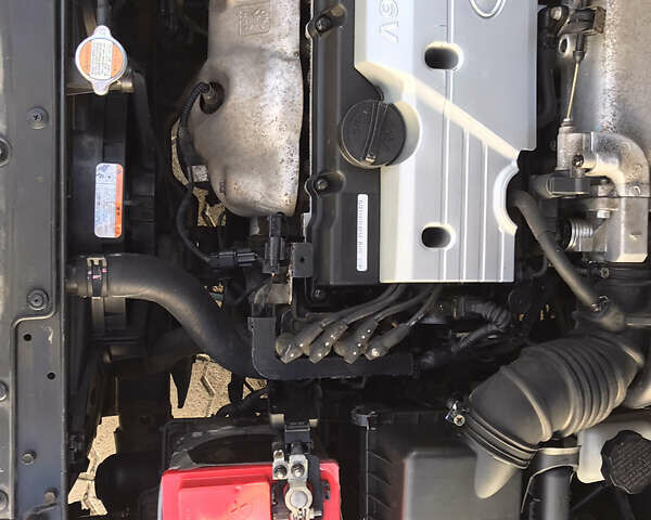 Черный Киа Рио, объемом двигателя 1.4 л и пробегом 291 тыс. км за 5500 $, фото 10 на Automoto.ua