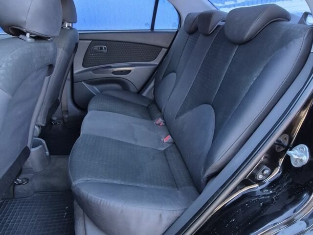 Черный Киа Рио, объемом двигателя 1.4 л и пробегом 220 тыс. км за 4400 $, фото 13 на Automoto.ua