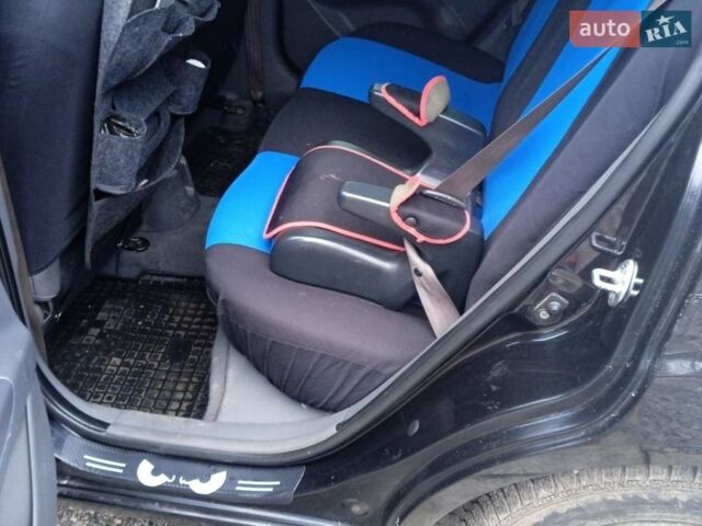 Черный Киа Рио, объемом двигателя 1.4 л и пробегом 168 тыс. км за 5600 $, фото 17 на Automoto.ua