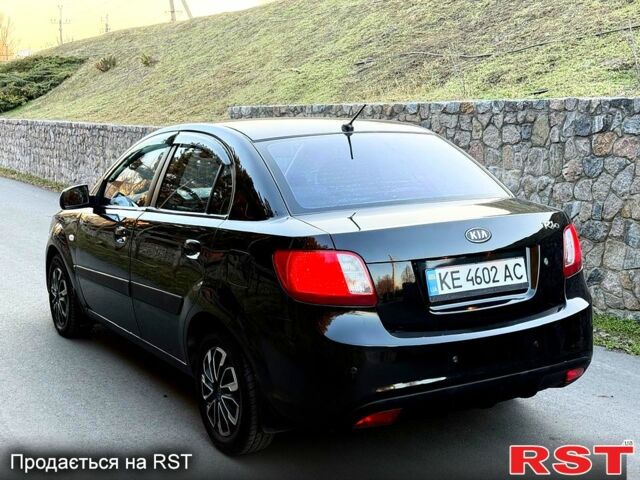 Черный Киа Рио, объемом двигателя 1.4 л и пробегом 224 тыс. км за 4999 $, фото 3 на Automoto.ua