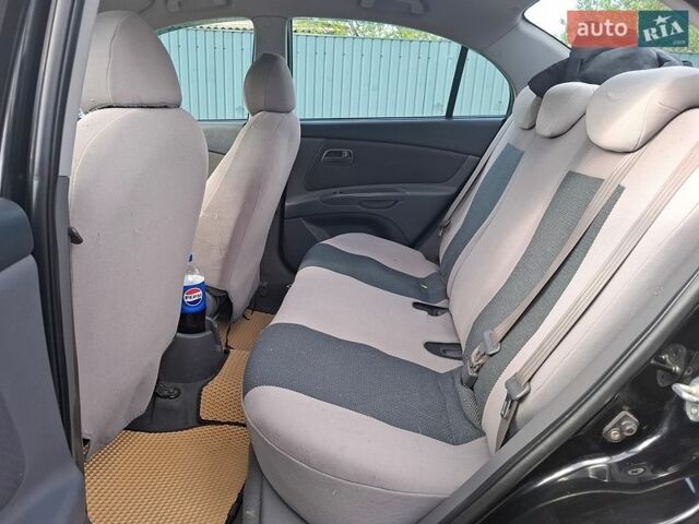 Черный Киа Рио, объемом двигателя 1.4 л и пробегом 156 тыс. км за 4800 $, фото 6 на Automoto.ua