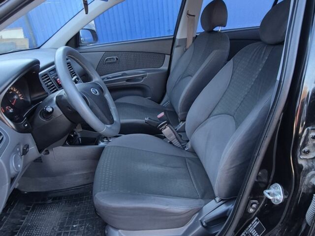 Черный Киа Рио, объемом двигателя 1.4 л и пробегом 220 тыс. км за 4400 $, фото 11 на Automoto.ua