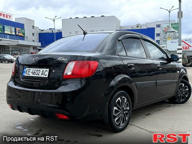Чорний Кіа Ріо, об'ємом двигуна 1.4 л та пробігом 220 тис. км за 4700 $, фото 6 на Automoto.ua