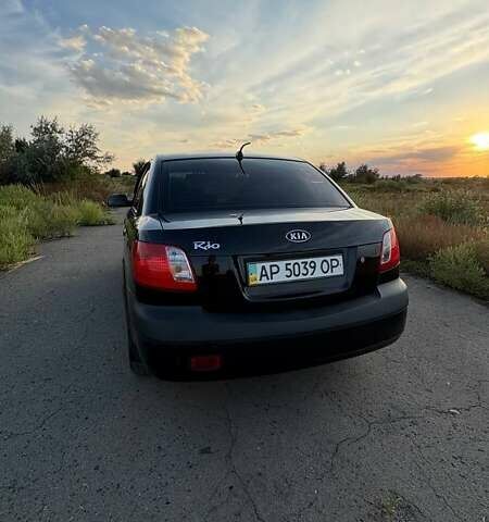 Черный Киа Рио, объемом двигателя 1.4 л и пробегом 168 тыс. км за 5600 $, фото 3 на Automoto.ua