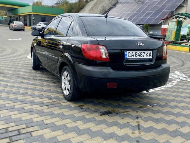 Черный Киа Рио, объемом двигателя 1.4 л и пробегом 152 тыс. км за 4600 $, фото 2 на Automoto.ua