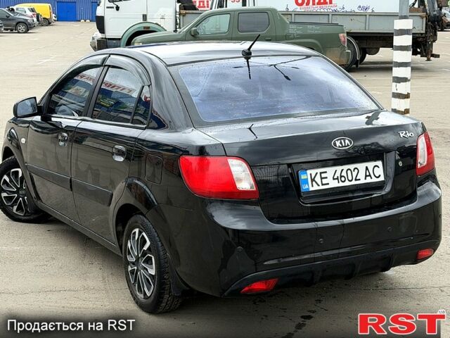 Чорний Кіа Ріо, об'ємом двигуна 1.4 л та пробігом 220 тис. км за 4700 $, фото 3 на Automoto.ua