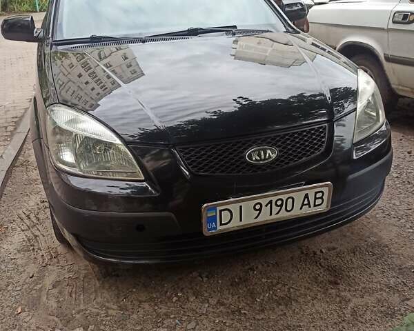 Чорний Кіа Ріо, об'ємом двигуна 1.4 л та пробігом 260 тис. км за 3800 $, фото 7 на Automoto.ua