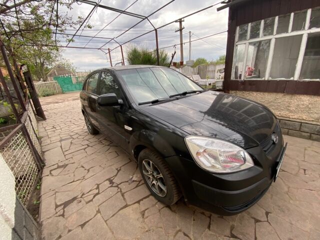 Черный Киа Рио, объемом двигателя 1.4 л и пробегом 250 тыс. км за 3399 $, фото 2 на Automoto.ua