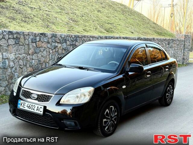 Черный Киа Рио, объемом двигателя 1.4 л и пробегом 224 тыс. км за 4999 $, фото 2 на Automoto.ua