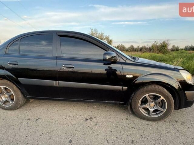 Чорний Кіа Ріо, об'ємом двигуна 1.4 л та пробігом 168 тис. км за 5500 $, фото 12 на Automoto.ua