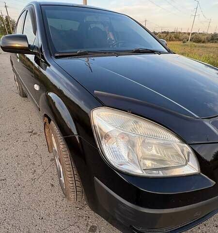 Черный Киа Рио, объемом двигателя 1.4 л и пробегом 168 тыс. км за 5600 $, фото 11 на Automoto.ua