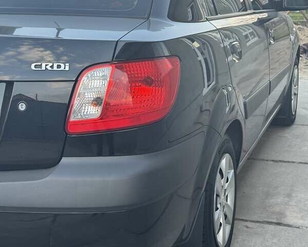 Черный Киа Рио, объемом двигателя 1.5 л и пробегом 287 тыс. км за 5500 $, фото 14 на Automoto.ua