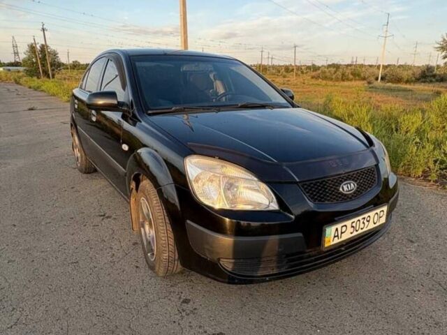 Чорний Кіа Ріо, об'ємом двигуна 1.4 л та пробігом 168 тис. км за 5500 $, фото 1 на Automoto.ua
