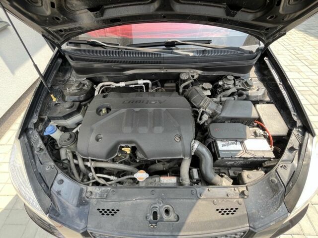 Чорний Кіа Ріо, об'ємом двигуна 1.5 л та пробігом 259 тис. км за 4388 $, фото 4 на Automoto.ua