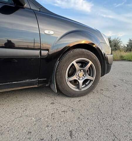 Черный Киа Рио, объемом двигателя 1.4 л и пробегом 168 тыс. км за 5600 $, фото 8 на Automoto.ua