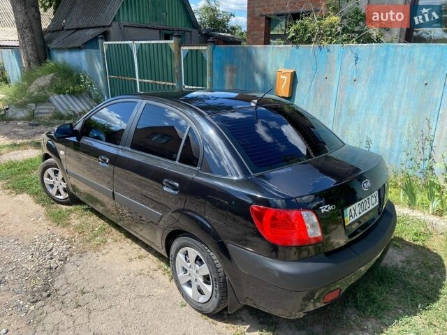Черный Киа Рио, объемом двигателя 1.4 л и пробегом 214 тыс. км за 4600 $, фото 1 на Automoto.ua