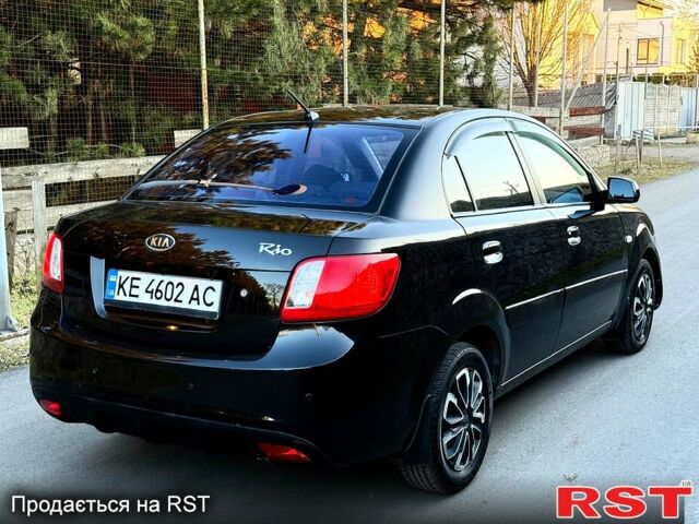 Черный Киа Рио, объемом двигателя 1.4 л и пробегом 224 тыс. км за 4999 $, фото 1 на Automoto.ua