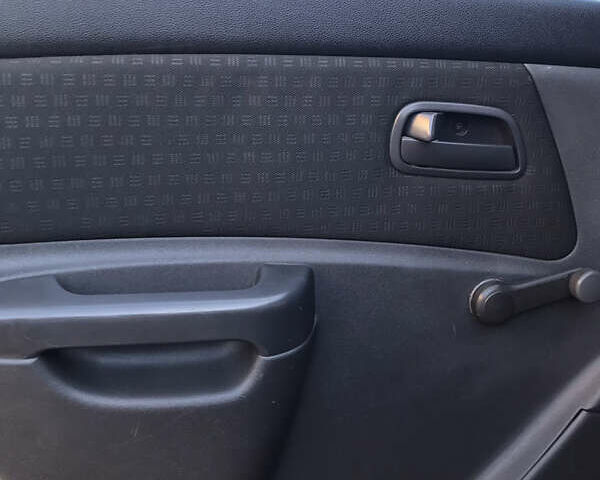 Черный Киа Рио, объемом двигателя 1.4 л и пробегом 291 тыс. км за 5500 $, фото 15 на Automoto.ua