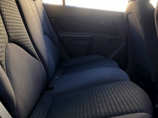 Чорний Кіа Ріо, об'ємом двигуна 1.4 л та пробігом 291 тис. км за 4200 $, фото 8 на Automoto.ua