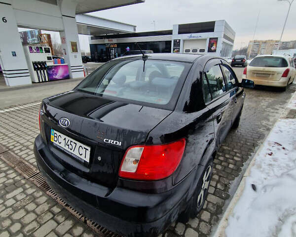 Чорний Кіа Ріо, об'ємом двигуна 1.49 л та пробігом 234 тис. км за 3400 $, фото 10 на Automoto.ua