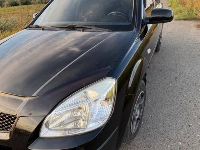 Чорний Кіа Ріо, об'ємом двигуна 1.4 л та пробігом 168 тис. км за 5500 $, фото 13 на Automoto.ua