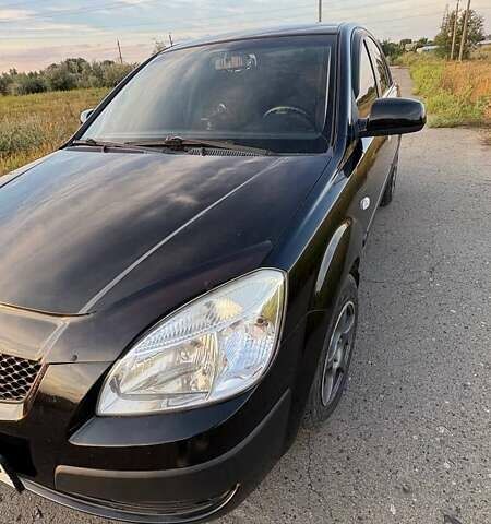 Черный Киа Рио, объемом двигателя 1.4 л и пробегом 168 тыс. км за 5600 $, фото 18 на Automoto.ua