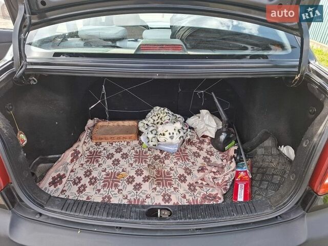 Черный Киа Рио, объемом двигателя 1.4 л и пробегом 156 тыс. км за 4800 $, фото 7 на Automoto.ua