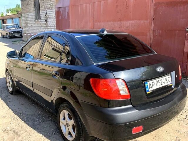 Чорний Кіа Ріо, об'ємом двигуна 1.5 л та пробігом 236 тис. км за 4500 $, фото 4 на Automoto.ua