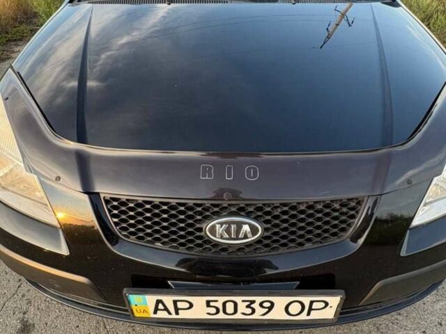 Чорний Кіа Ріо, об'ємом двигуна 1.4 л та пробігом 168 тис. км за 5500 $, фото 10 на Automoto.ua