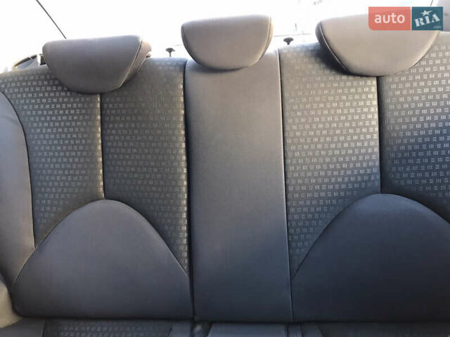 Черный Киа Рио, объемом двигателя 1.4 л и пробегом 291 тыс. км за 5500 $, фото 16 на Automoto.ua