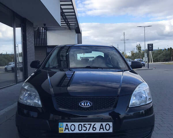 Черный Киа Рио, объемом двигателя 1.4 л и пробегом 291 тыс. км за 5500 $, фото 8 на Automoto.ua