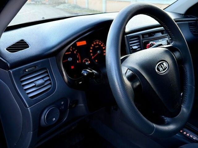 Черный Киа Рио, объемом двигателя 1.4 л и пробегом 224 тыс. км за 4999 $, фото 9 на Automoto.ua