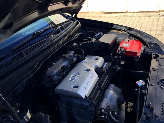 Чорний Кіа Ріо, об'ємом двигуна 1.4 л та пробігом 291 тис. км за 4200 $, фото 10 на Automoto.ua