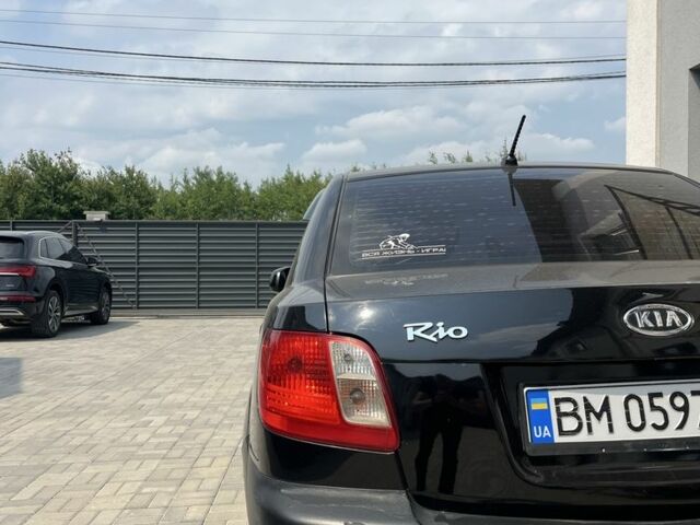 Чорний Кіа Ріо, об'ємом двигуна 1.5 л та пробігом 259 тис. км за 4388 $, фото 1 на Automoto.ua