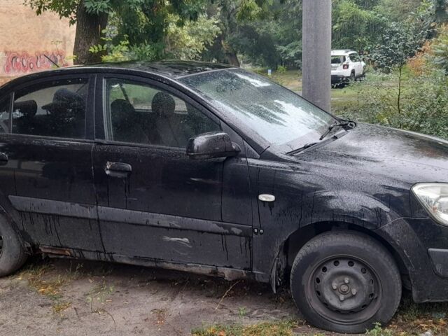 Чорний Кіа Ріо, об'ємом двигуна 1.4 л та пробігом 270 тис. км за 2198 $, фото 1 на Automoto.ua