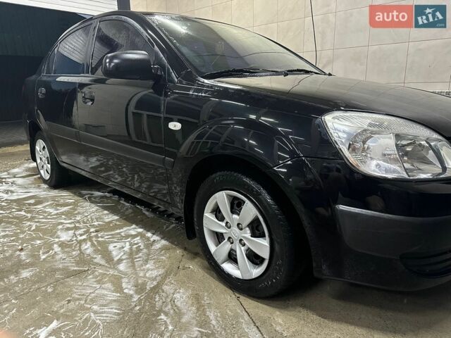 Черный Киа Рио, объемом двигателя 1.4 л и пробегом 216 тыс. км за 3300 $, фото 1 на Automoto.ua