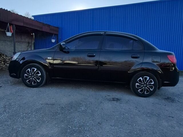 Черный Киа Рио, объемом двигателя 1.4 л и пробегом 220 тыс. км за 4400 $, фото 9 на Automoto.ua