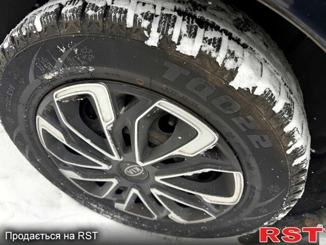 Чорний Кіа Ріо, об'ємом двигуна 1.4 л та пробігом 167 тис. км за 5550 $, фото 5 на Automoto.ua