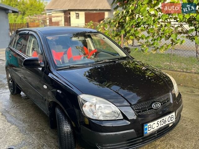 Черный Киа Рио, объемом двигателя 1.4 л и пробегом 210 тыс. км за 5500 $, фото 18 на Automoto.ua