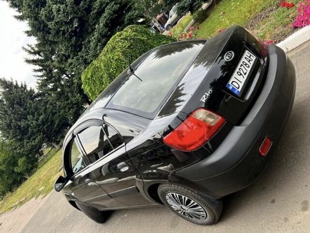 Черный Киа Рио, объемом двигателя 1.4 л и пробегом 252 тыс. км за 3889 $, фото 7 на Automoto.ua