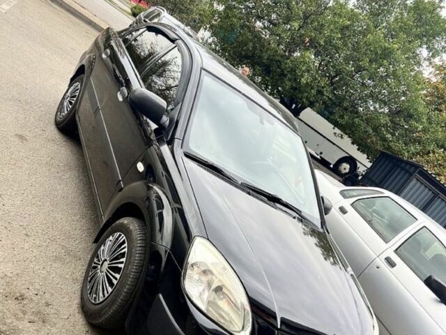 Черный Киа Рио, объемом двигателя 1.4 л и пробегом 252 тыс. км за 3889 $, фото 6 на Automoto.ua