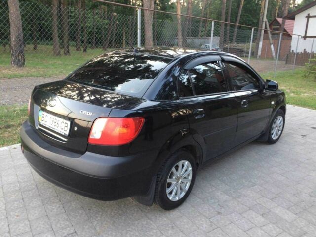 Чорний Кіа Ріо, об'ємом двигуна 1.6 л та пробігом 360 тис. км за 3900 $, фото 5 на Automoto.ua