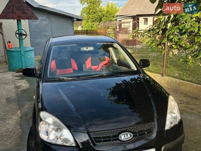 Черный Киа Рио, объемом двигателя 1.4 л и пробегом 210 тыс. км за 5500 $, фото 1 на Automoto.ua