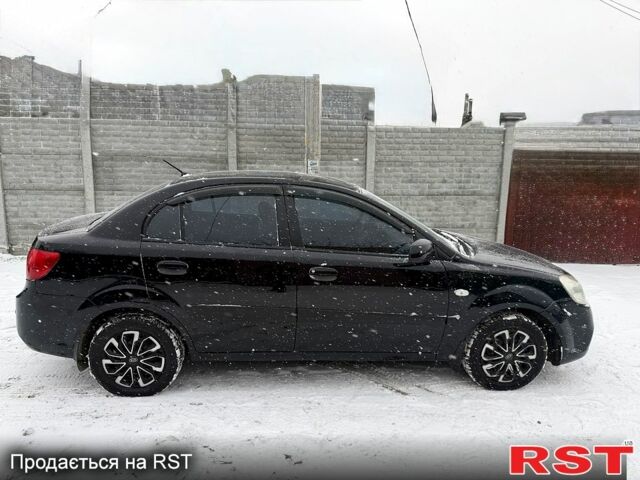 Чорний Кіа Ріо, об'ємом двигуна 1.4 л та пробігом 167 тис. км за 5550 $, фото 6 на Automoto.ua