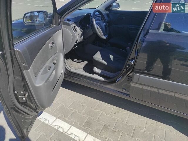 Чорний Кіа Ріо, об'ємом двигуна 1.4 л та пробігом 200 тис. км за 5500 $, фото 8 на Automoto.ua
