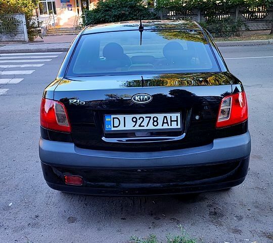 Чорний Кіа Ріо, об'ємом двигуна 1.4 л та пробігом 260 тис. км за 2800 $, фото 5 на Automoto.ua